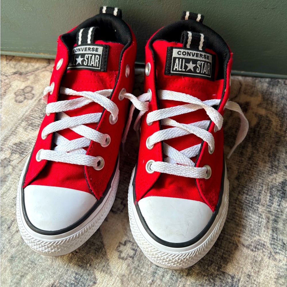 Red high top easy on size 13. Like new